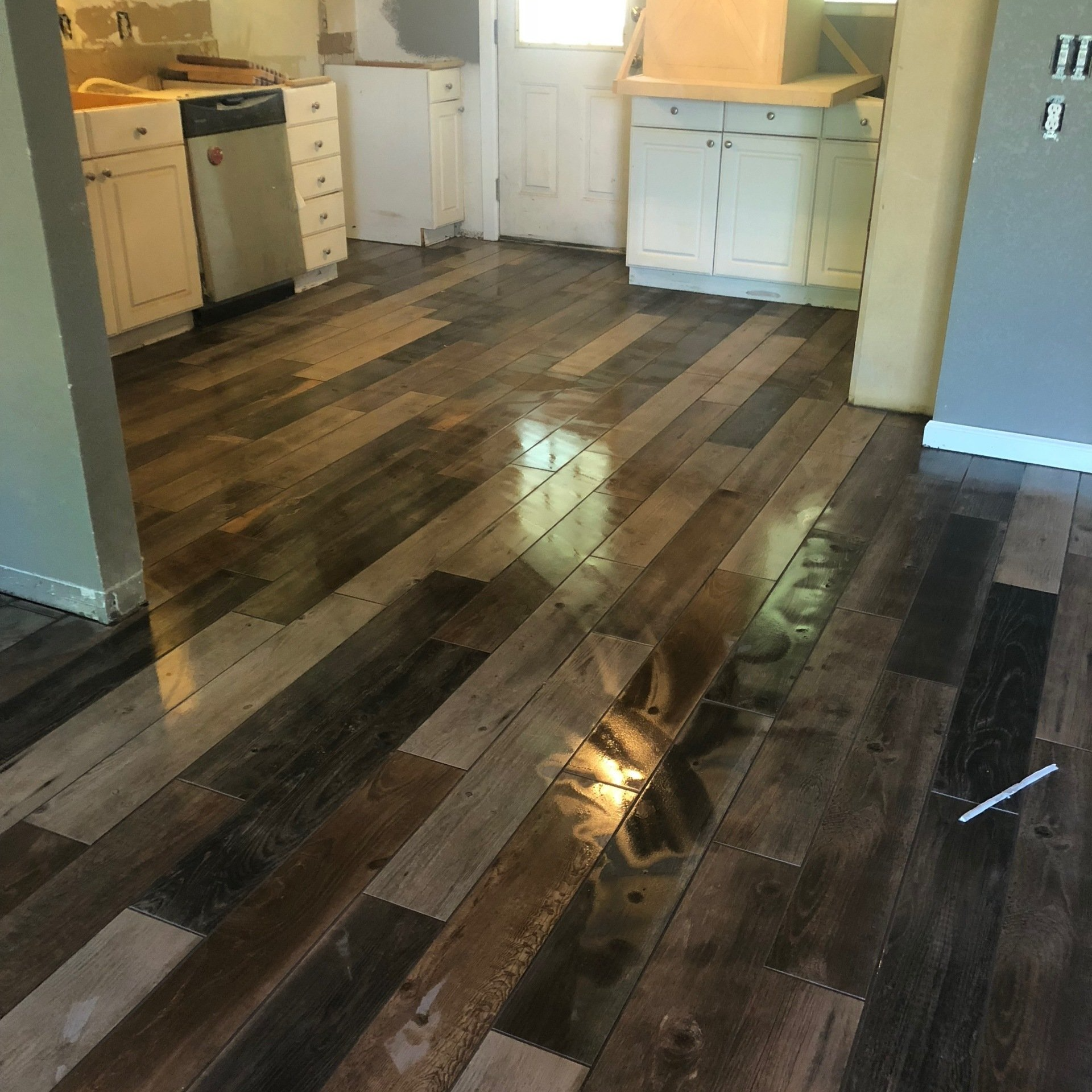 Kitchen and living room tile installed