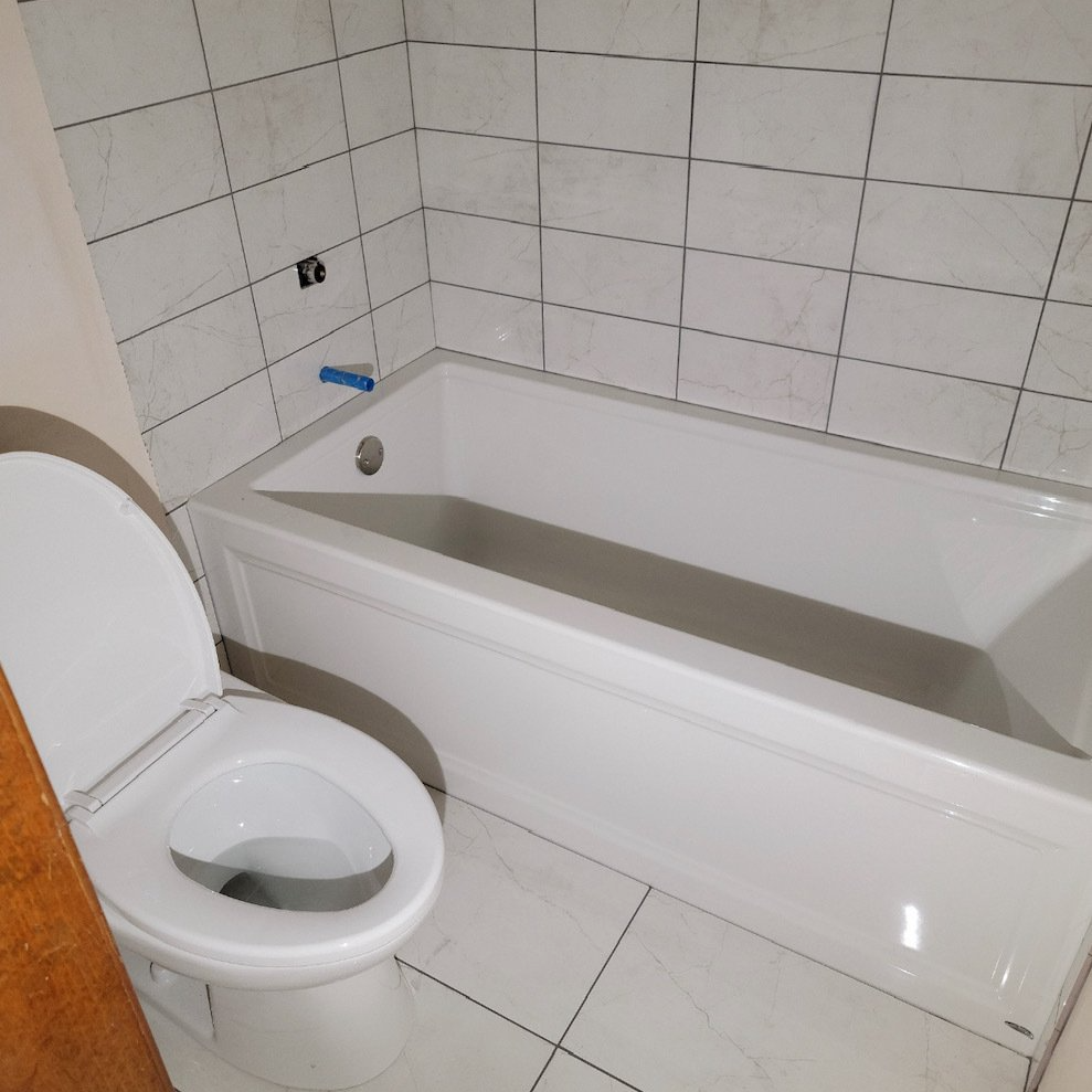 Bathtub tile installed, 8x10 tile, stacked vertical straight lay