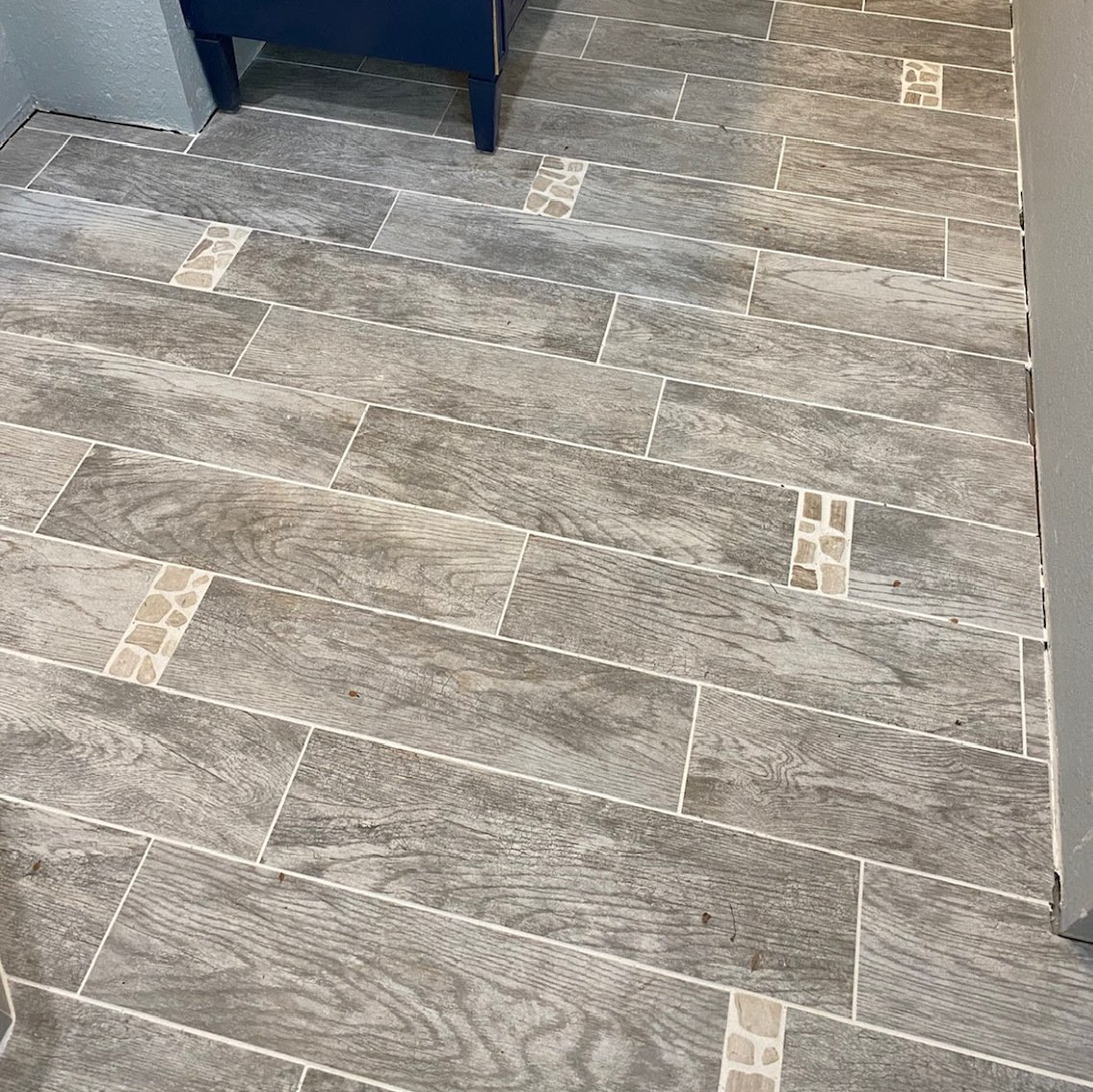 Wood look floor tile installation