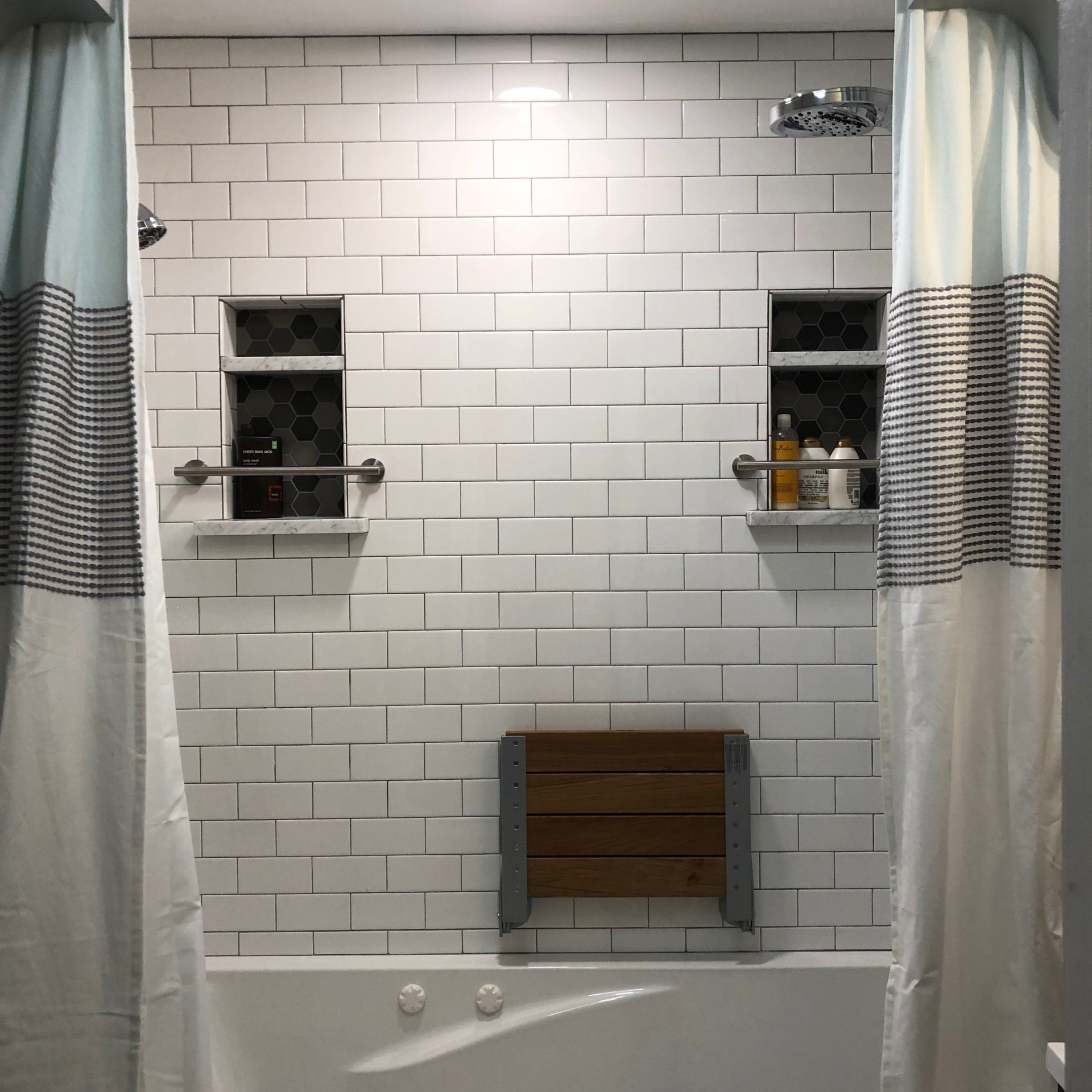 Bathtub tile installation, shampoo shelves