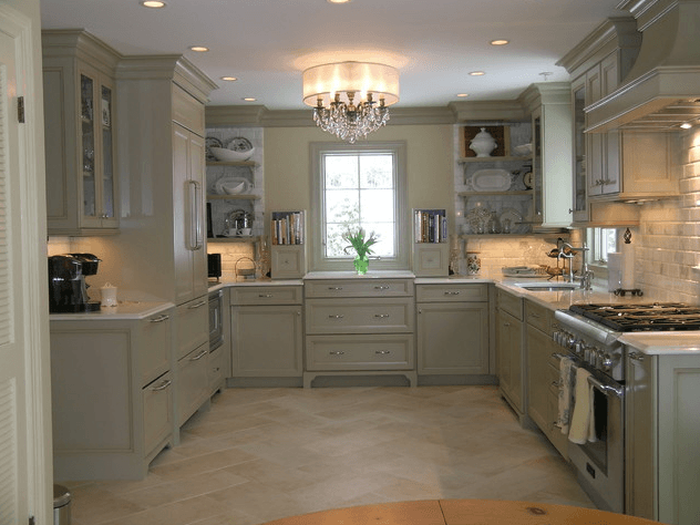 A kitchen with a lot of cabinets and a stove