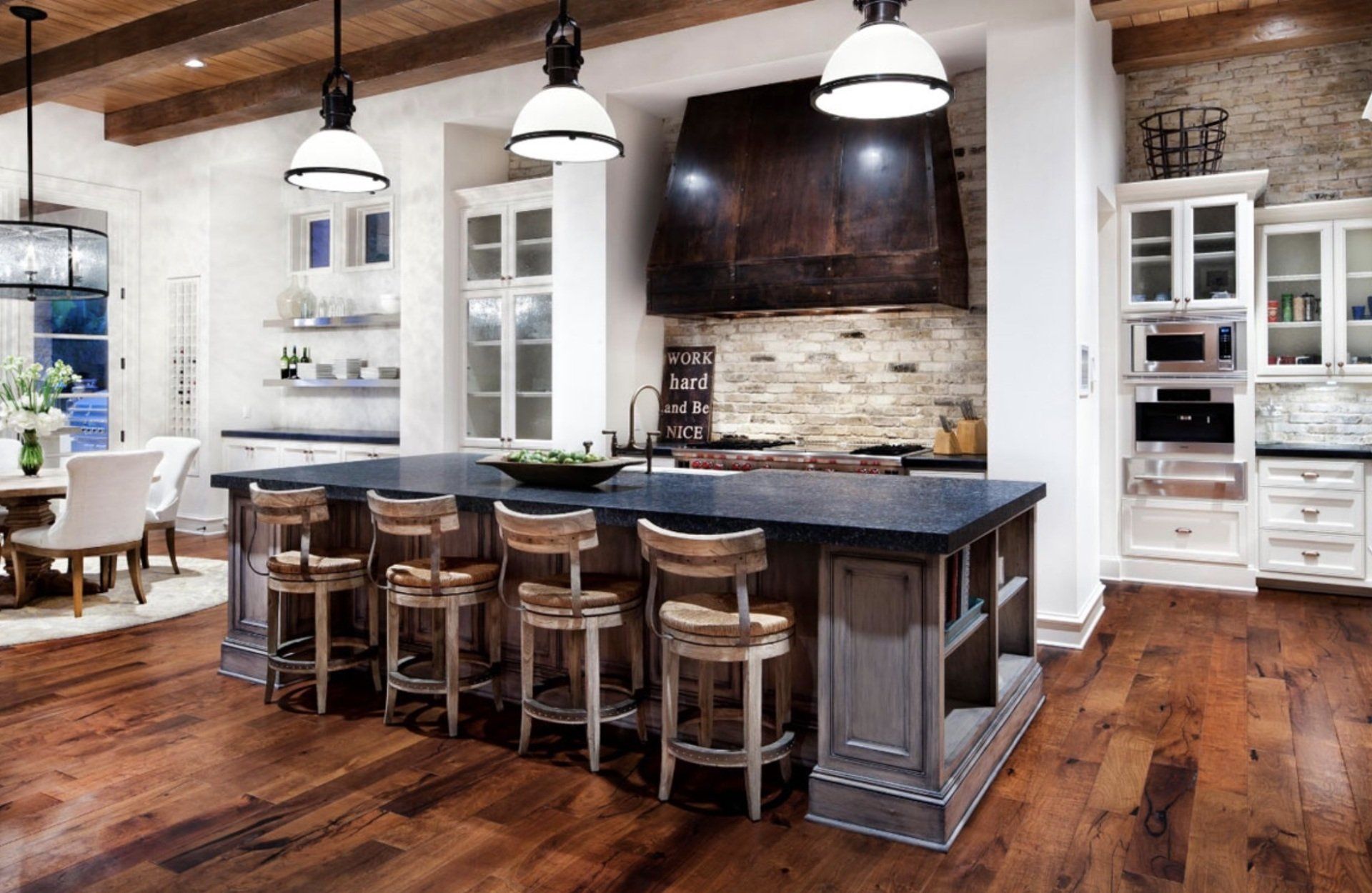 There is a large island in the middle of the kitchen.