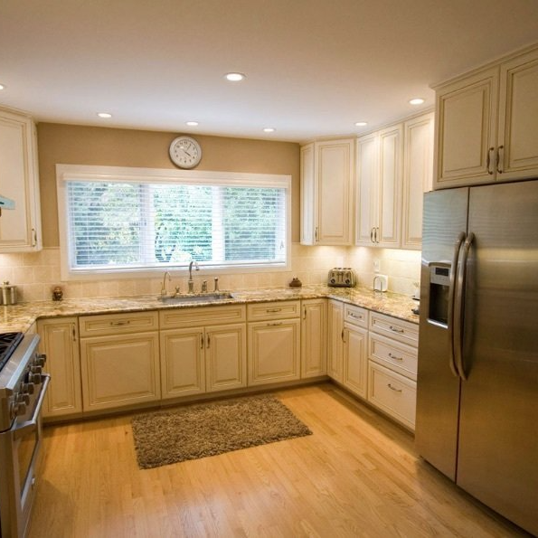 remodeled kitchen, wood floors and backsplash