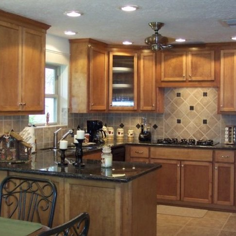 Backsplash tile installed in kitchen