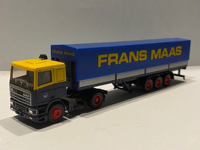 Frans Maas Herpa DAF 95 trailer harde gele tekst voorzijde