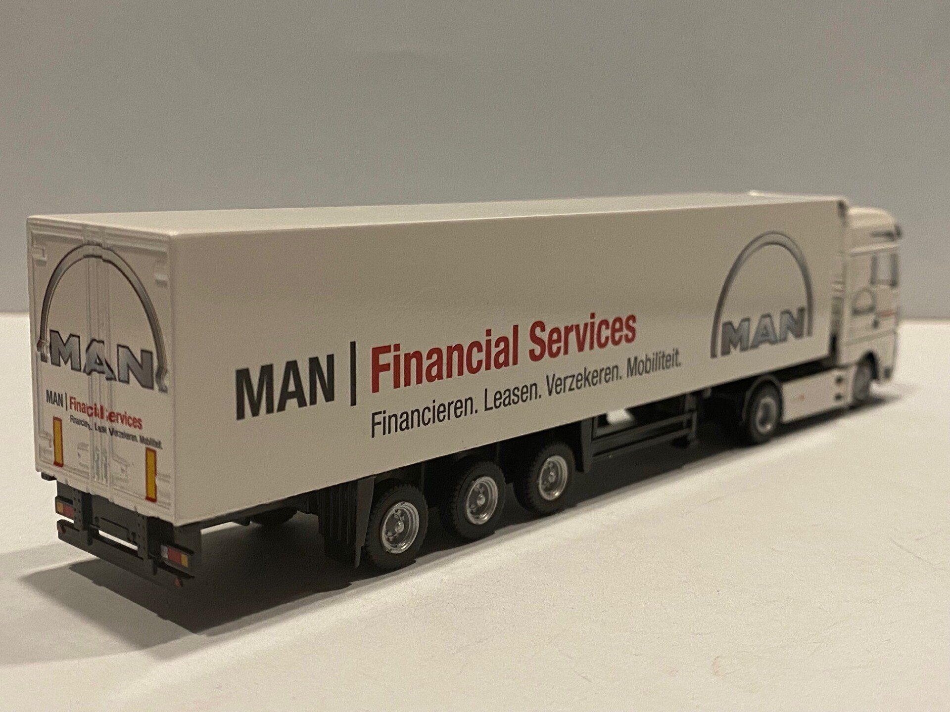 Volkswagen PON MAN Financial Services TemaToys 72-2013 MAN TGX XXL 4x2 achterzijde