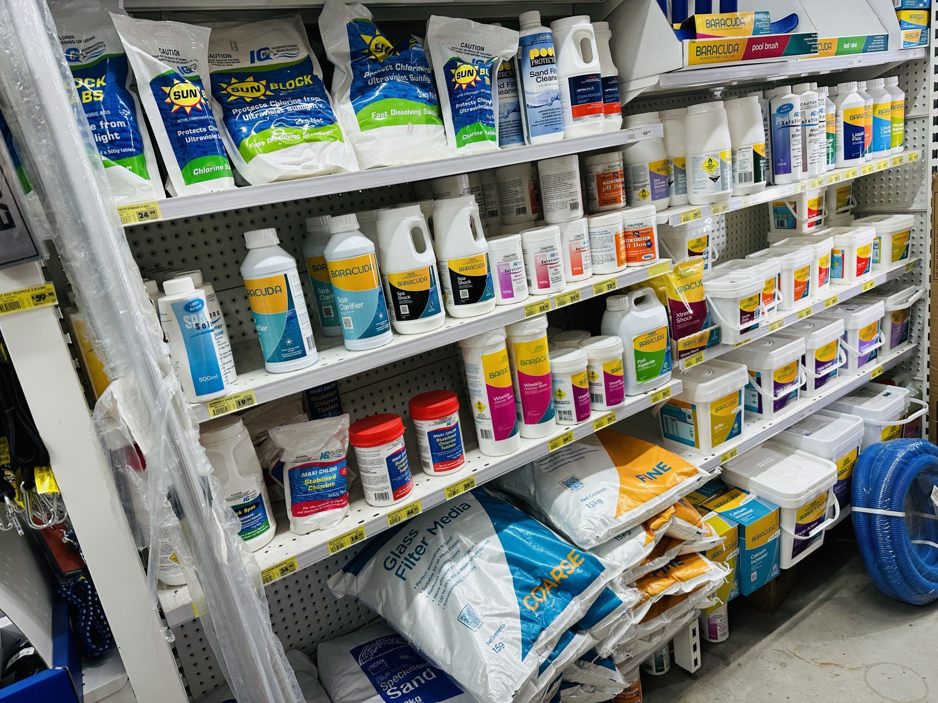 Bags Of Swimming Pool Salt Are Stacked On Top Of Each Other — Laurieton Warehouse in Laurieton, NSW