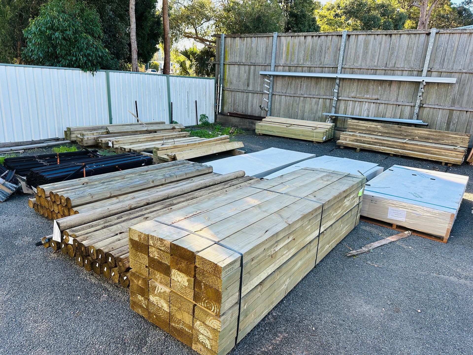 Store front with piles of mulch sacks and soil stacked at the store front— Laurieton Warehouse in Laurieton, NSW