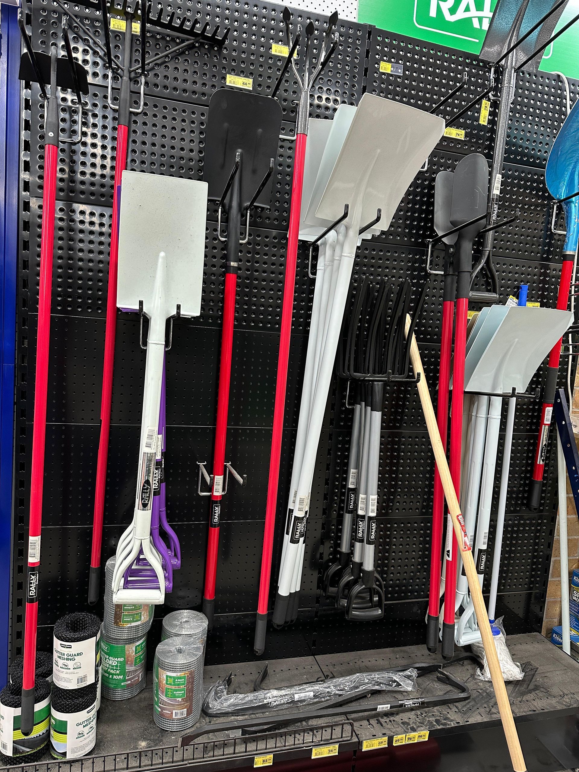 A Bunch Of Bags Of Cement Are Stacked On Top Of Each Other In A Store — Laurieton Warehouse in Laurieton, NSW