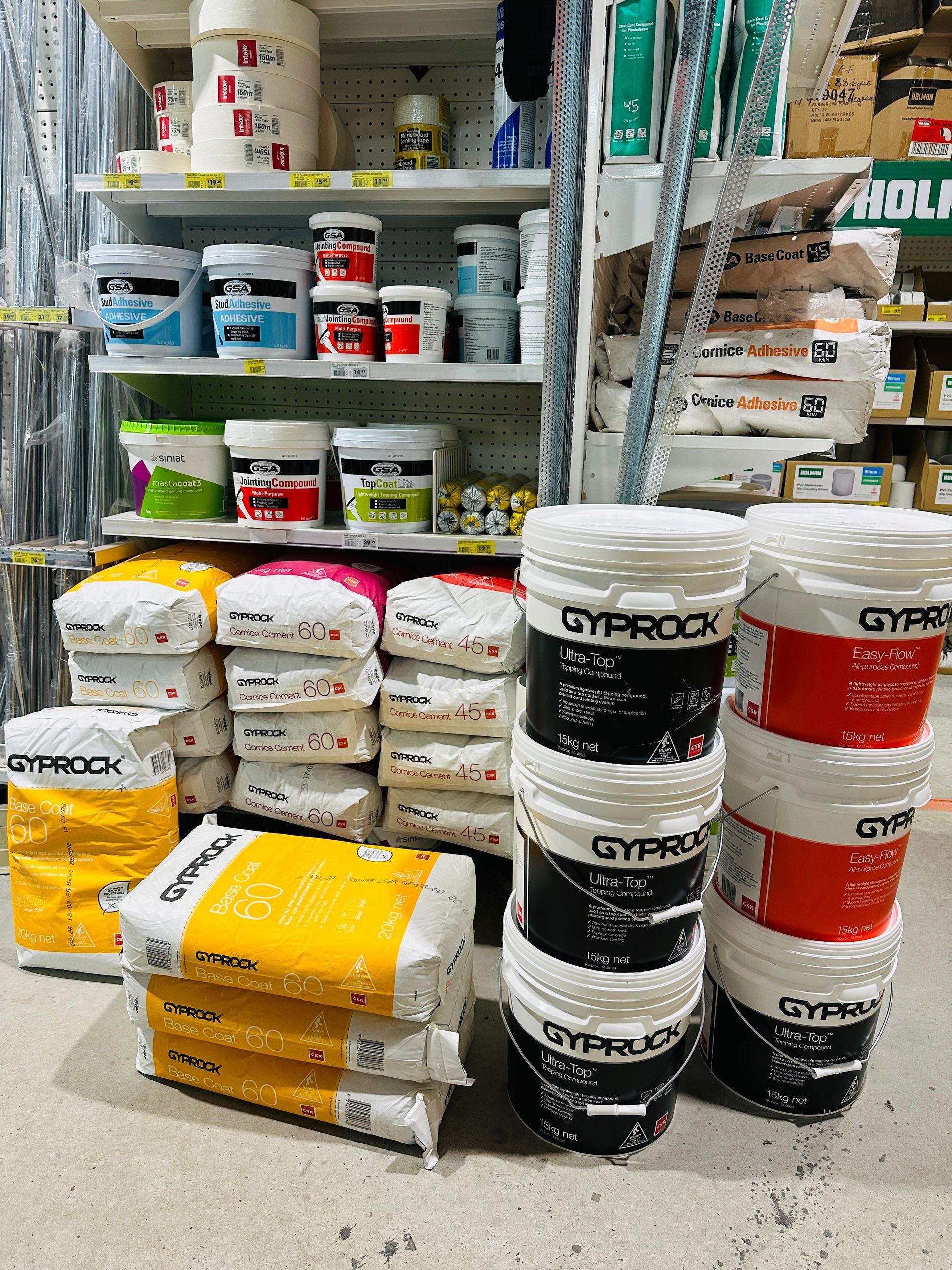 A Store Filled With Shelves Filled With Lots Of Different Types Of Paint — Laurieton Warehouse in Laurieton, NSW