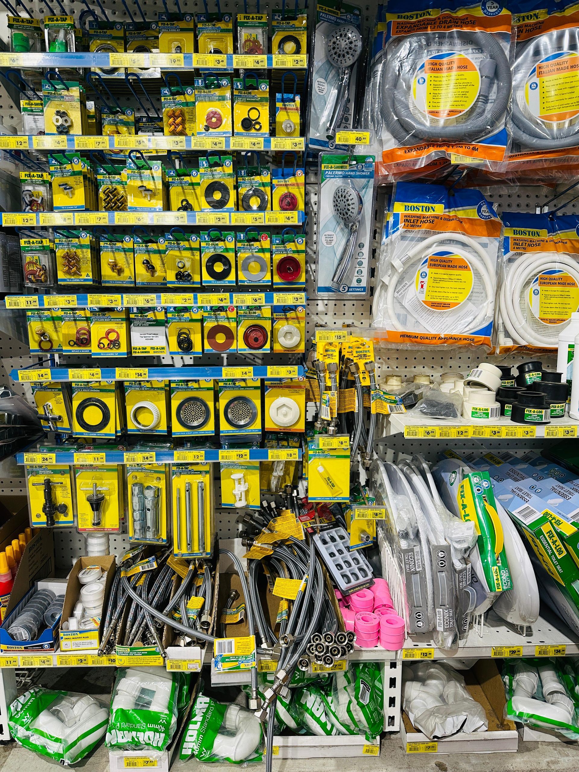 shelf stocked with plumbing repa — Laurieton Warehouse in Laurieton, NSW