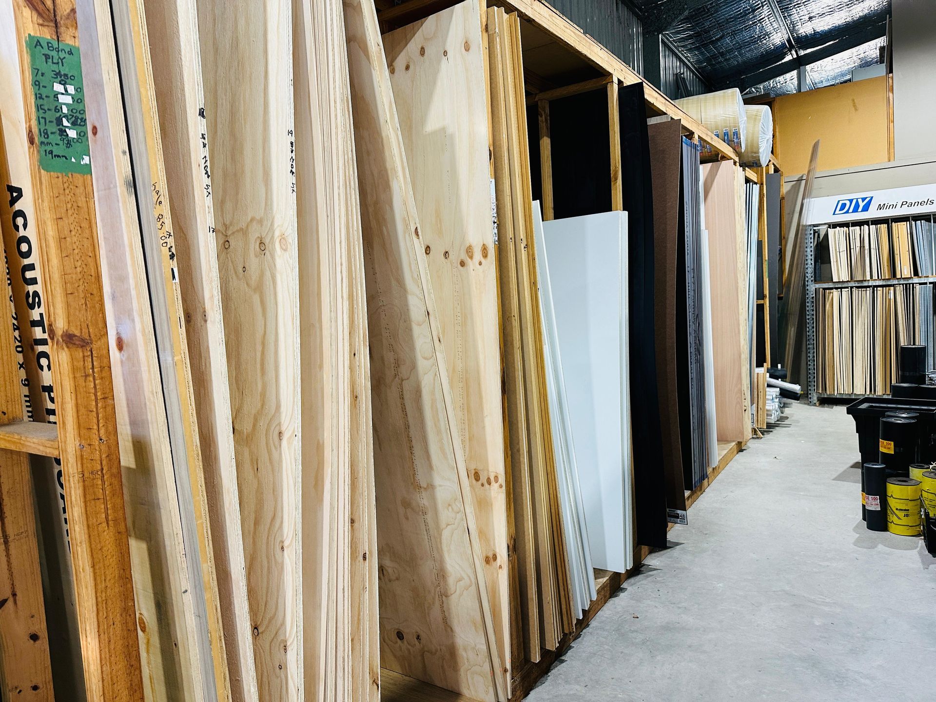 Timber yard with timber and plywood stacked nicely — Laurieton Warehouse in Laurieton, NSW