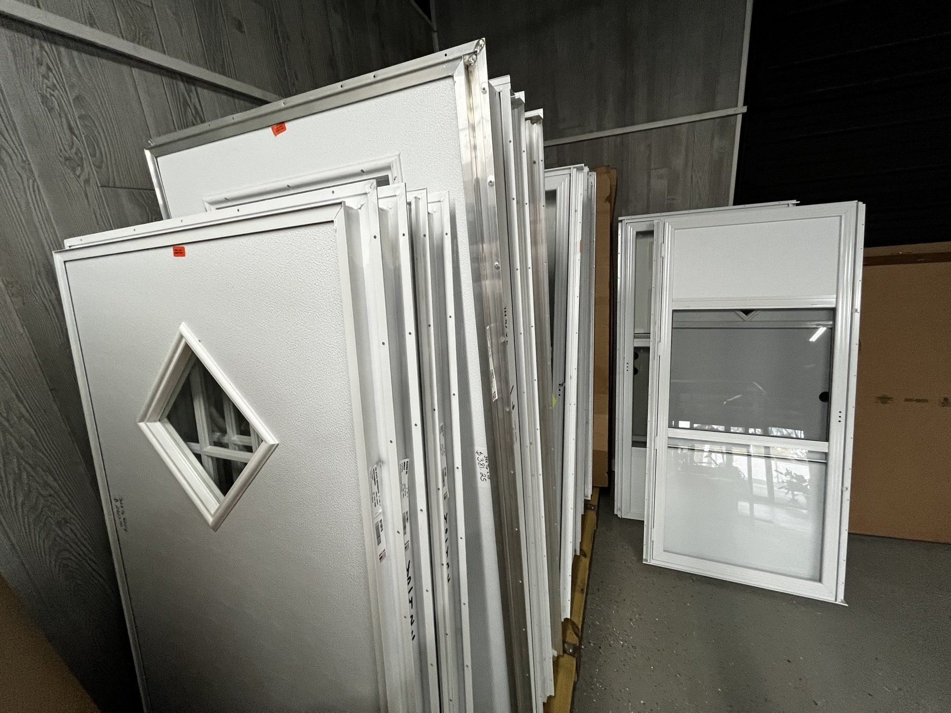 A stack of white doors with a diamond in the middle