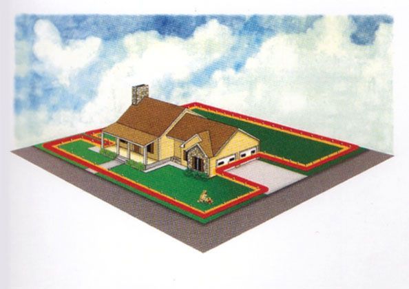An aerial view of a house with a fence around it