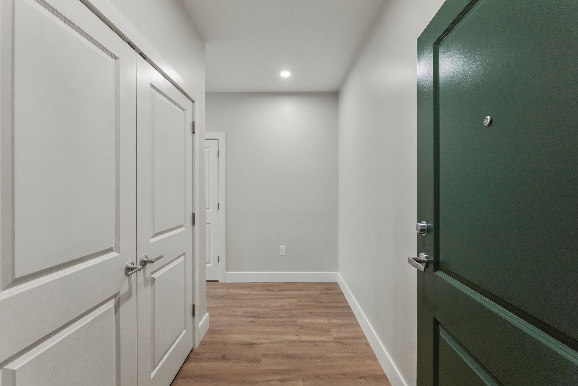 Hallway with storage.
