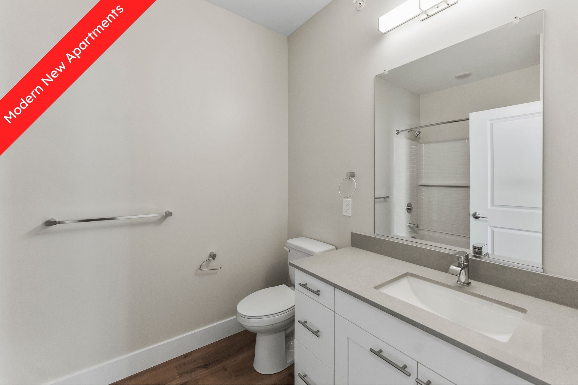 Bathroom with toilet and sink. 