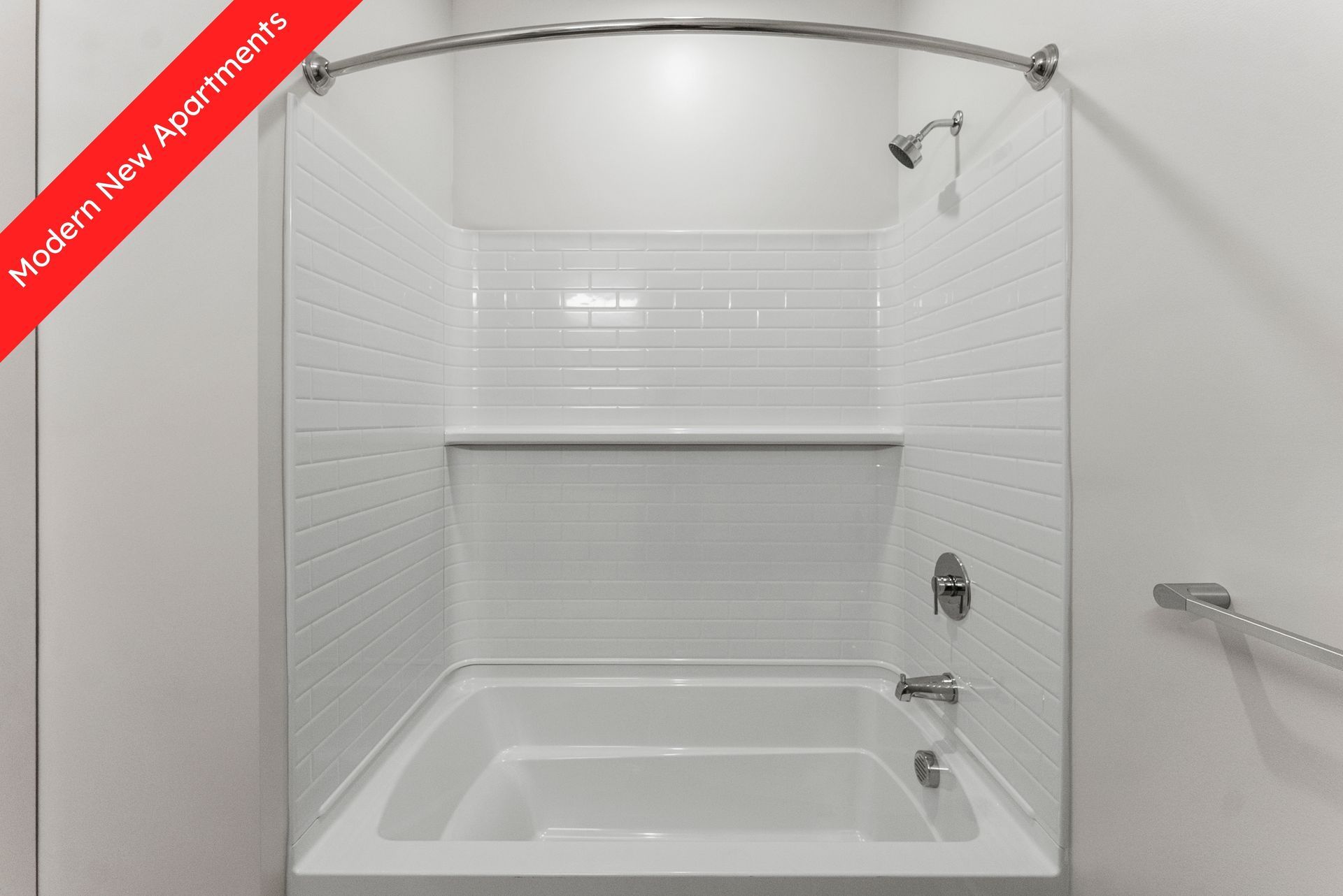 Shower/tub combination in bathroom. 