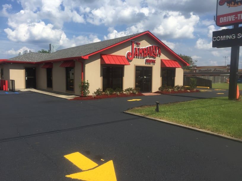 large painted arrows in parking lot