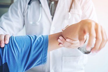 Pain Doctor — Doctor Consulting with Patient Shoulder Problems in Irvine, CA