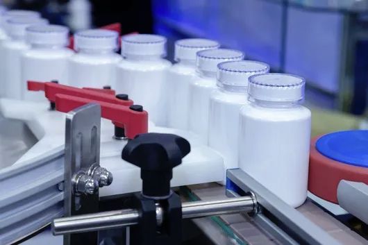 immagine macchinario riempimento barattoli