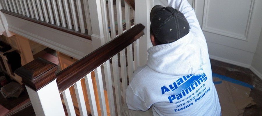 Ayala Painting Staff Painting the Staircase Handrail — Wilmington, DE — Ayala Painting