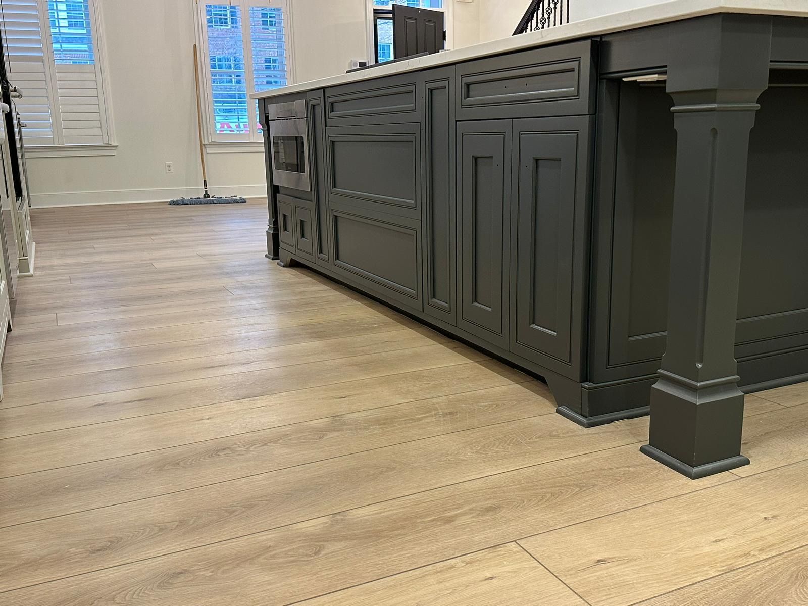 A Kitchen with A Large Island and A Wooden Floor — Wilmington, DE — Ayala Painting