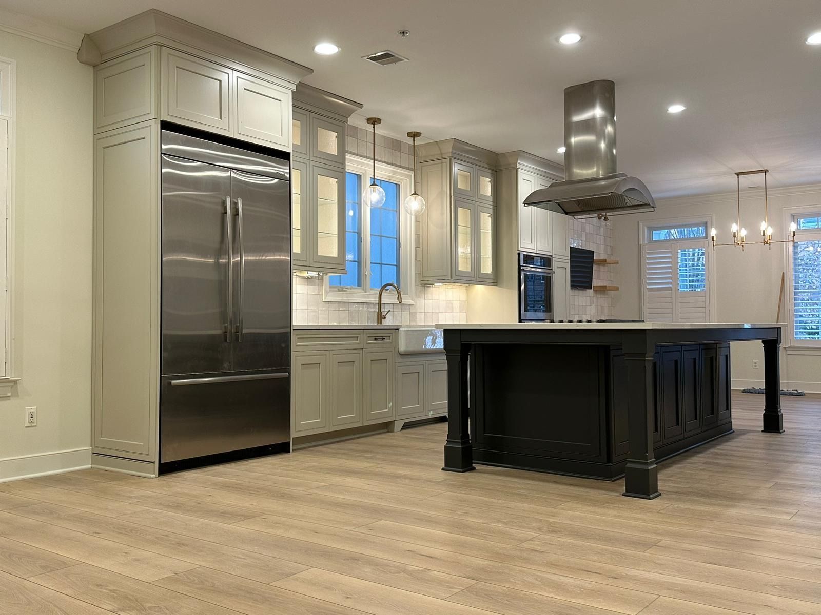 A Kitchen with Stainless Steel Appliances and A Large Island — Wilmington, DE — Ayala Painting