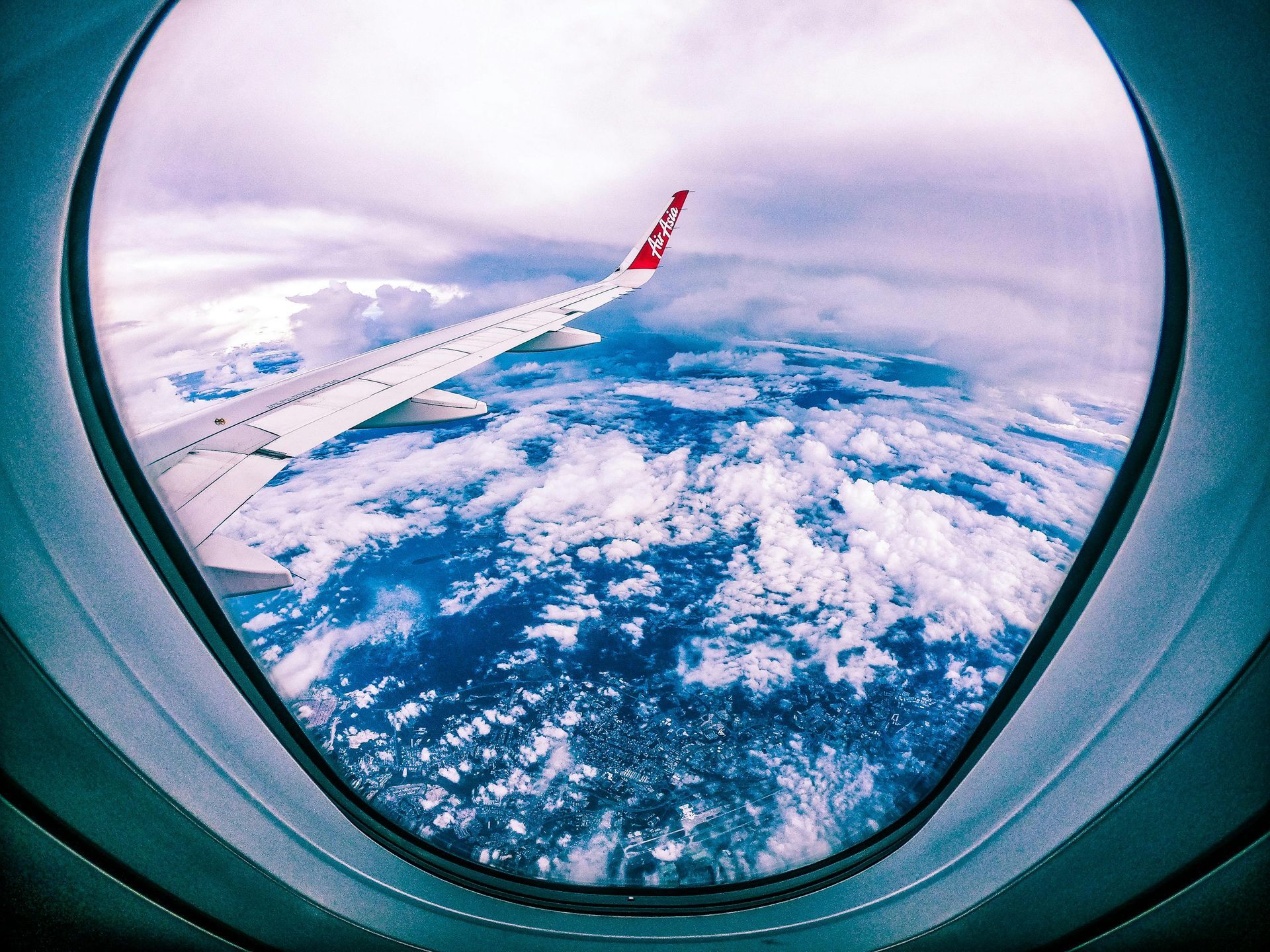 An airplane is parked on the tarmac at an airport