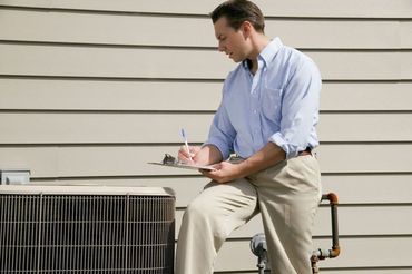 air conditioning unit inspection by HVAC contractors in Florence, MS