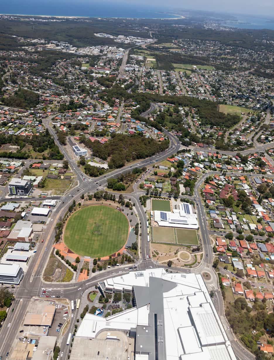 An Aerial View of A City with A Large Building in The Middle — Twin Lakes Towing & Recovery in Charlestown, NSW