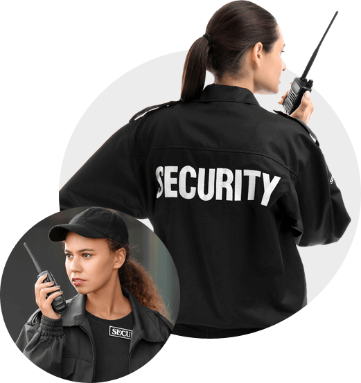 A woman in a security uniform is holding a walkie talkie.