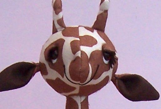giraffe with felt lids