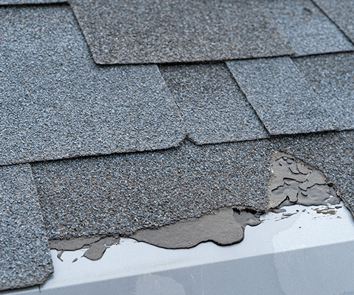 Shingles Roof Damage — Omaha, NE — Above & Beyond Roofing