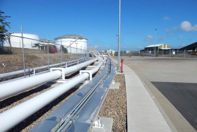 White Tubes At Electrical Power Plant — Electricians in Mackay, QLD