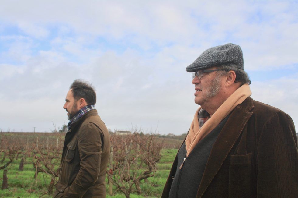 Ivan Massonat standing next to each other in a field.