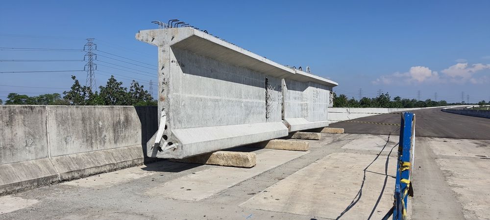 Large Concrete Bridge Beam Section Resting — East Point Earthmoving in Brunswick Heads, NSW