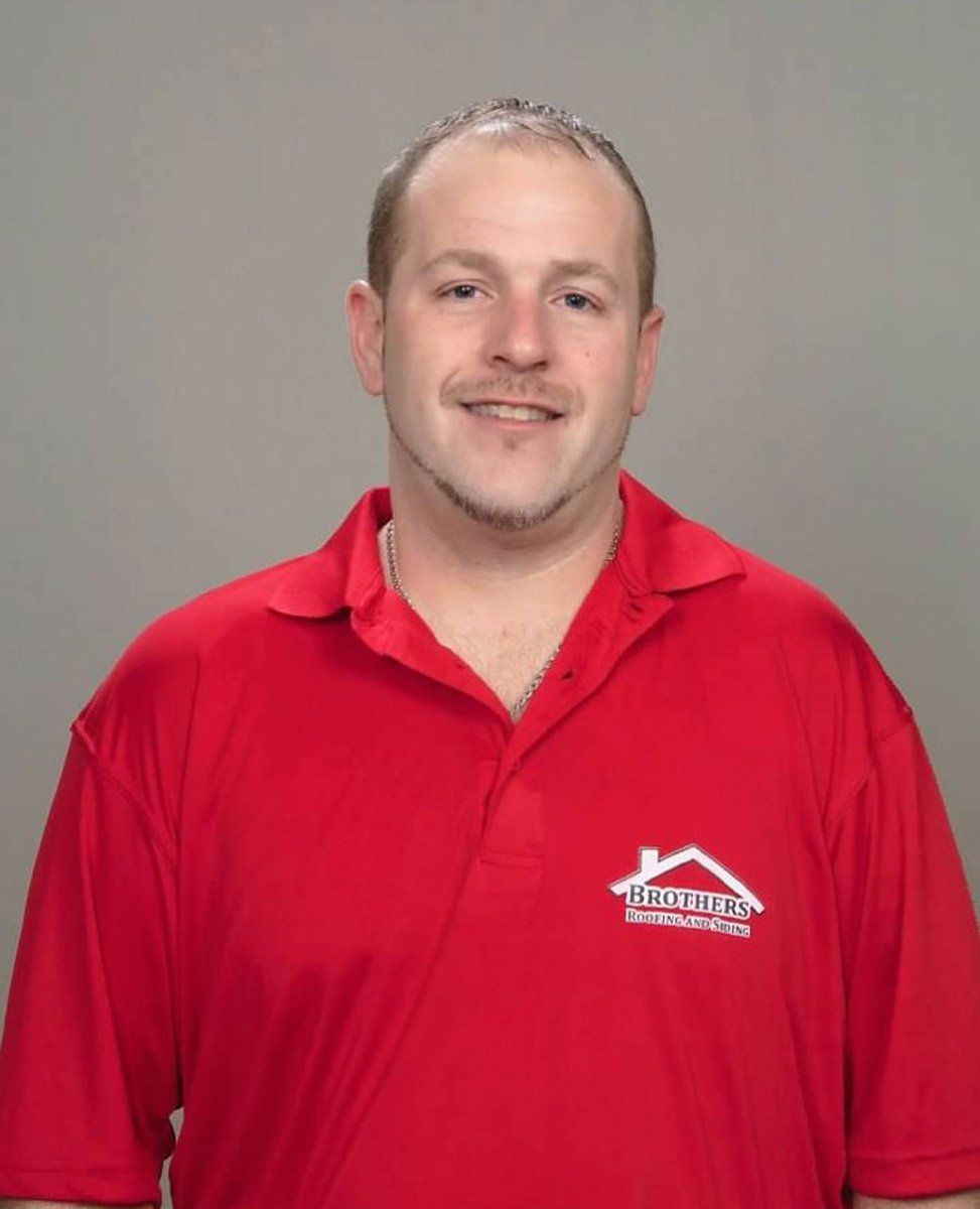 Smiling Member — Warren, OH — Brothers Roofing & Siding