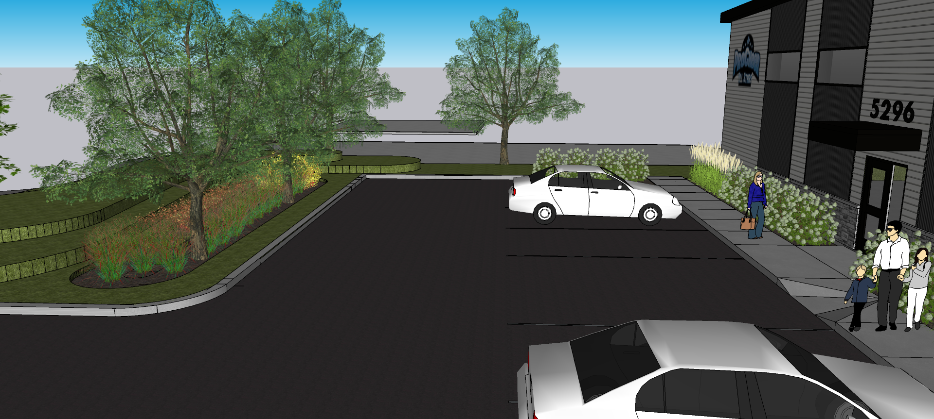 Une voiture blanche est garée sur le bord de la route