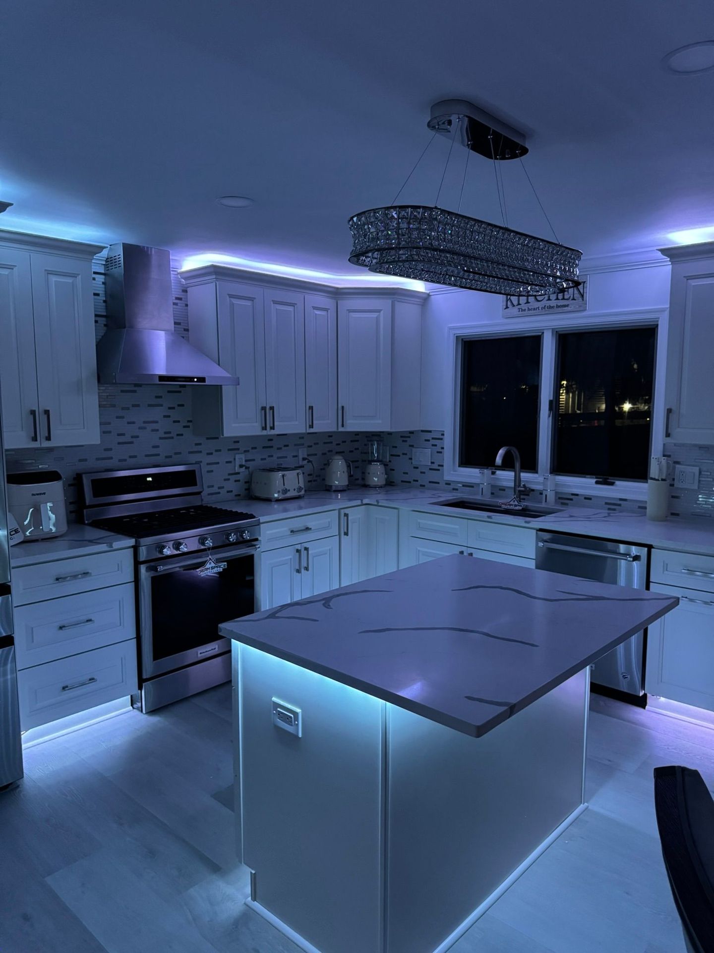 Luxury kitchen renovation with island and pendant lighting – Ellicott City, MD