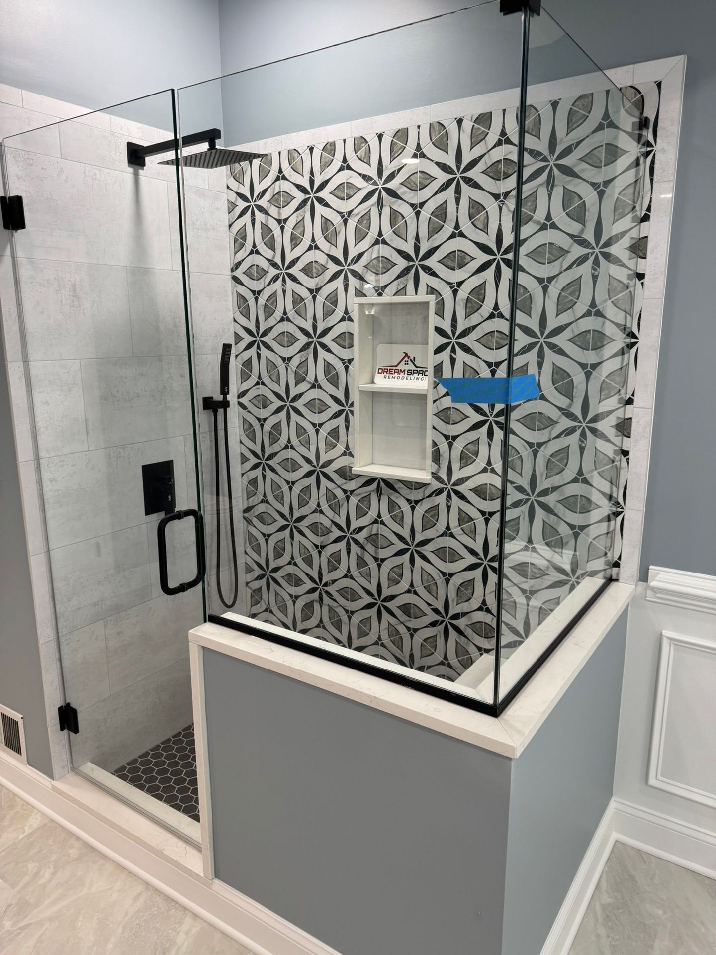 Bathroom renovation featuring double vanity and LED mirrors – Columbia, MD