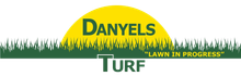 Logo for Danyels Turf. Yellow sun shape, green text and grass graphic. 