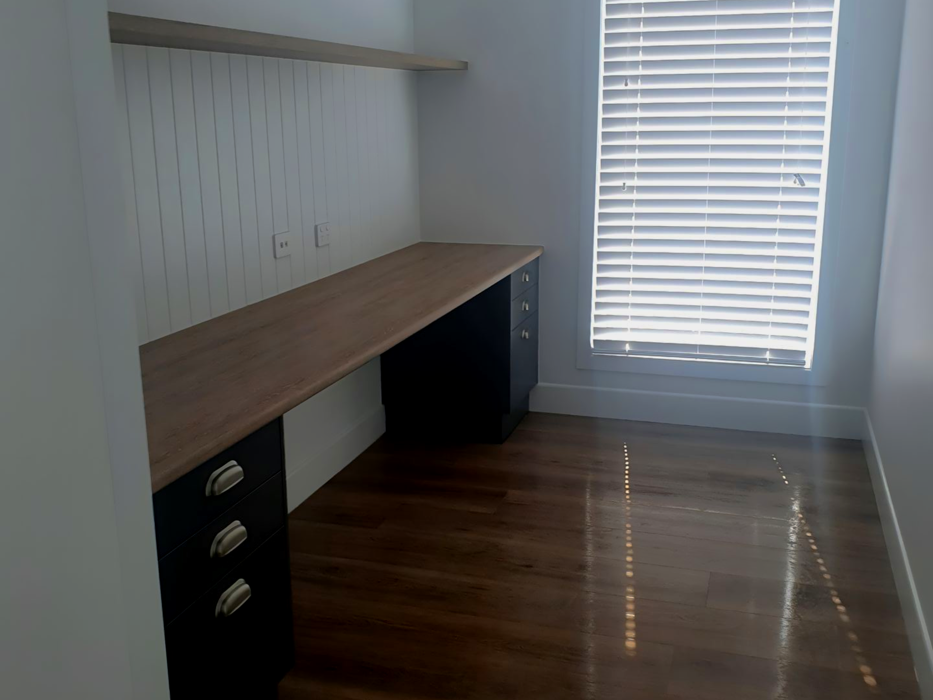 Small Office With a Wooden Desk, Dark Cabinets — Dream n Clean in Wilsonton Heights, QLD