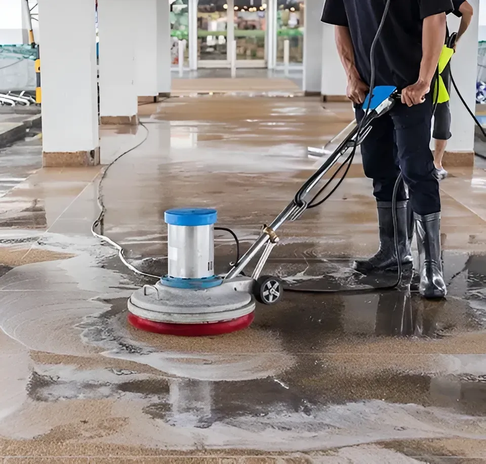 Person Using a Floor Cleaning Machine to Scrub — Dream n Clean in Wilsonton Heights, QLD