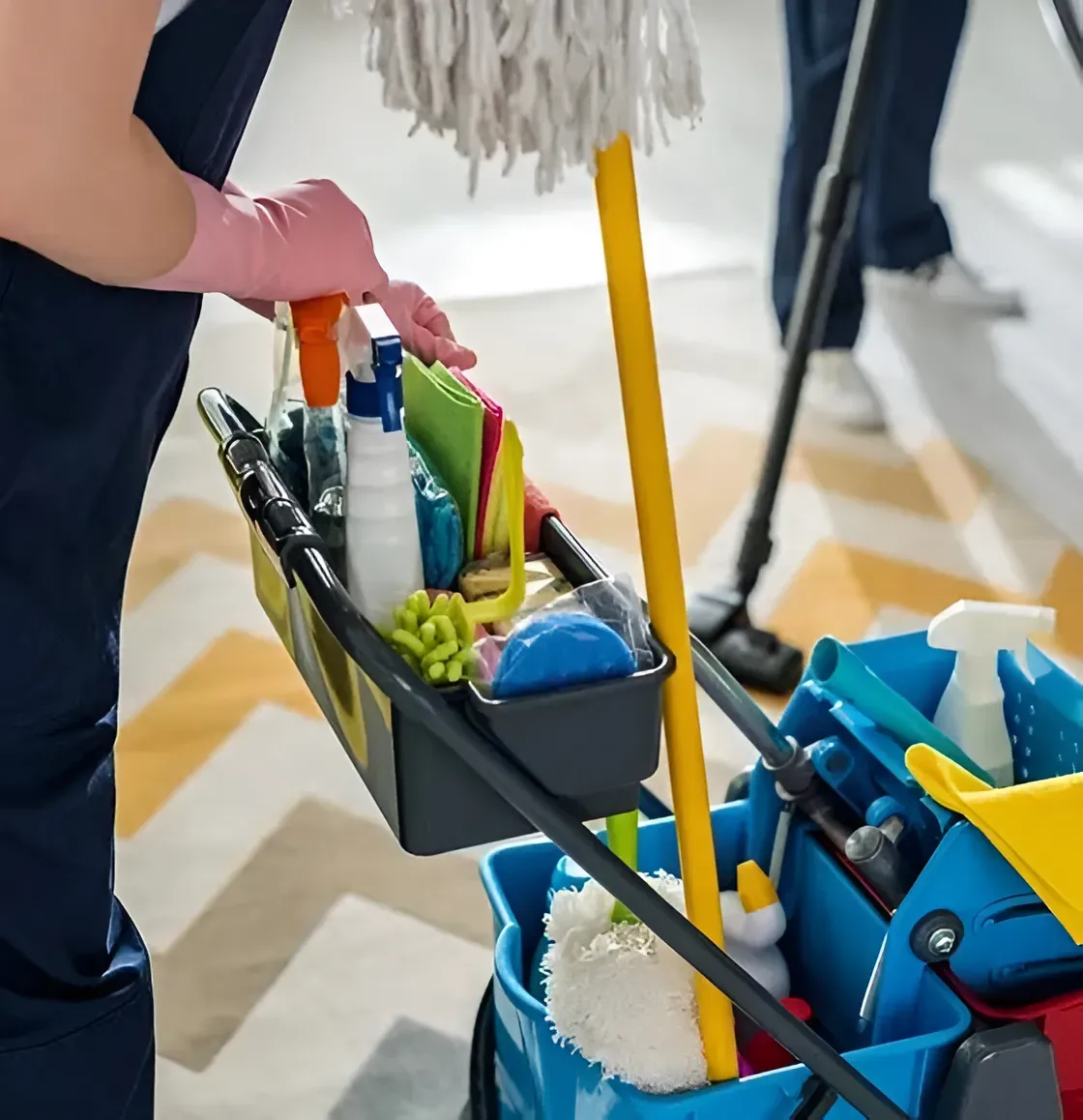 Person in Pink Gloves With Cleaning Supplies on a Cart — Dream n Clean in Wilsonton Heights, QLD