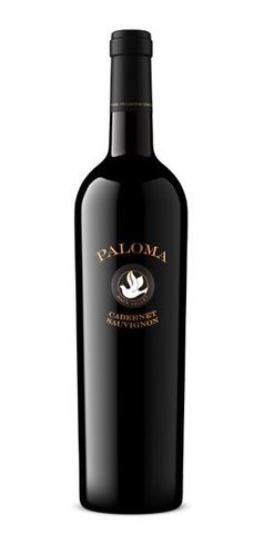 A bottle of paloma wine with a bird on the label