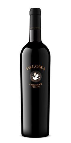 A bottle of paloma wine with a bird on the label
