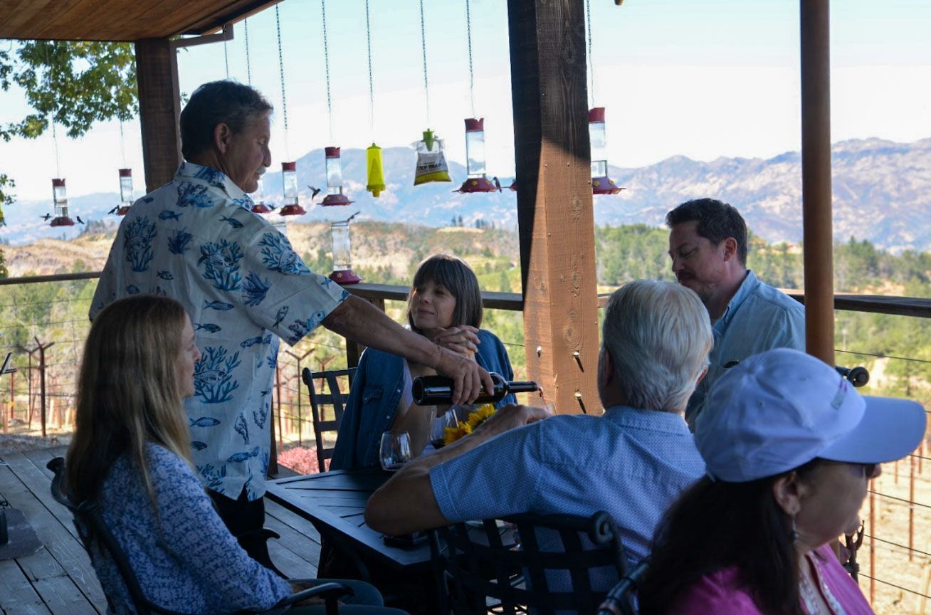 wine tasting on the deck at Paloma