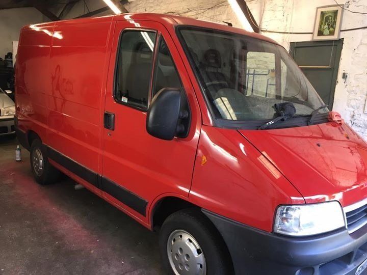 Shiny red van