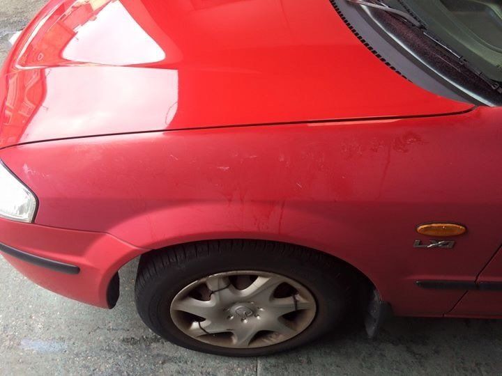 Left top shot of red car