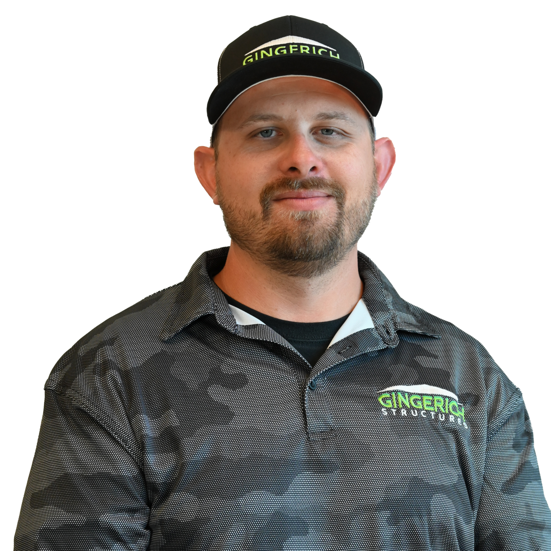 Man wearing a baseball cap and a polo shirt, smiling. The shirt and cap have a company logo.